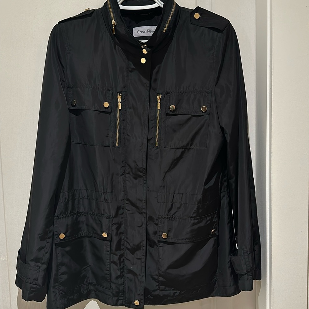 Lightweight hooded Calvin Klein jacket.